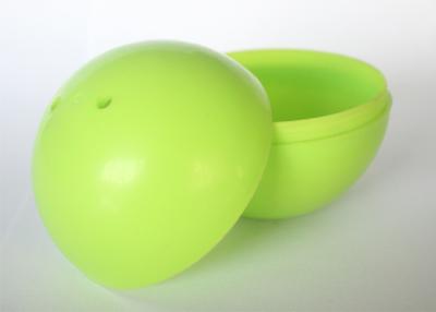 China Solid Green Plastic Toy Capsules , 7cm Round Plastic Egg Toy Capsules For Vending Machines for sale