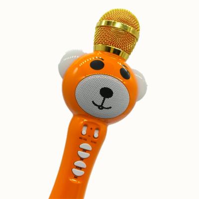 China New Cute Handheld Microphone Karaoke Microphone Wireless Mini KTV Speaker For Kids Singing for sale