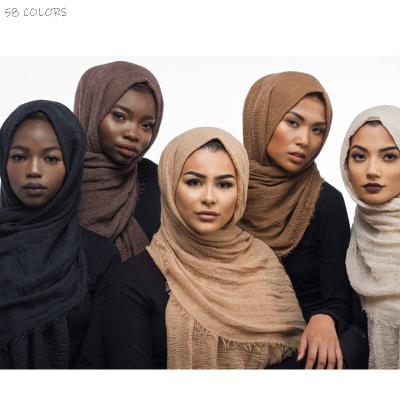 China Outdoor activities 2021 hot products fashion style excellent plain fantastic color crinkle wholesale Muslim Hija scarf women wholesale for sale