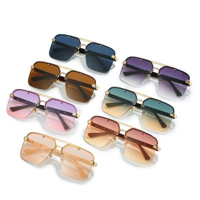 China Luxury Designer Fashion Sunglasses Oval Rimless SunglassesSummer Lenses Shape Sun Glasses For Men Women UV400 Sunglasses for sale