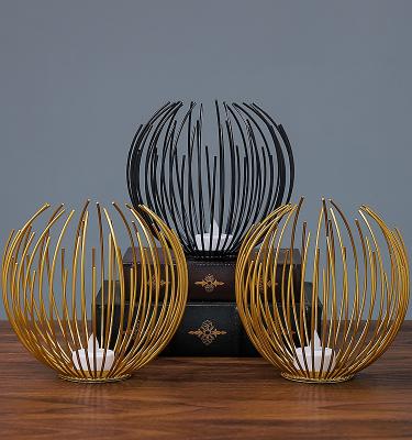 China Unique Art Redeco High Quality Modern Metal Wire Candle Holder With Various Lengths Around Pumpkin Candlestick Holder for sale