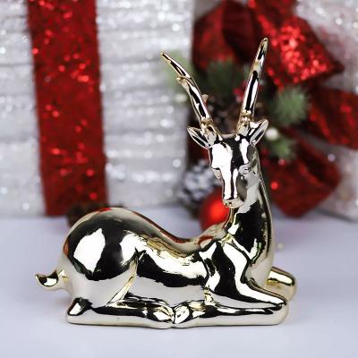 China Indoor Christmas Decoration New Arrival Christmas Reindeer Figurine Ornament Silver Plating Electroplating Ceramic Reindeer for sale