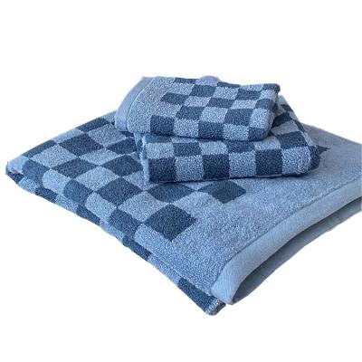 China Compressed Terry Dyed Check Jacquard Yarn Woven Beach Towel Bath for sale