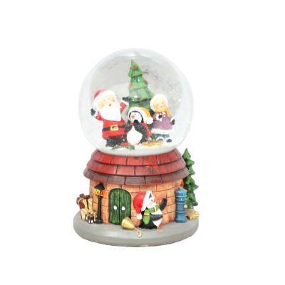 China High Quality Glass Water Polo Ornaments Europe Dehua Santa Claus With Snowflake Crystal Ball Home Decorations for sale