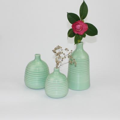 China 100% Handmade Ceramic Ornaments Vase Custom Color Origami Lines Split Glaze Home Office Decoration Simple Vase for sale