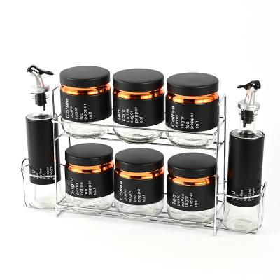 China Sustainable Kitchen Storage Glass Black Bottles Oil Spice Bottles And Jar Set With Seasoning Rack for sale