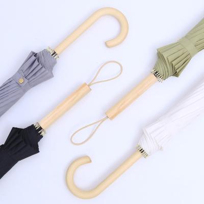 China Wholesale Traditional 16K Cheap Customize Straight Curved Wooden Handle Umbrella For Rain for sale