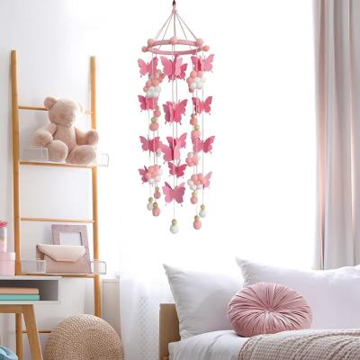 China Cheap loose bulk pink pom ball butterfly crib crib boho buy toy hanging decoration felt baby mobiles for sale