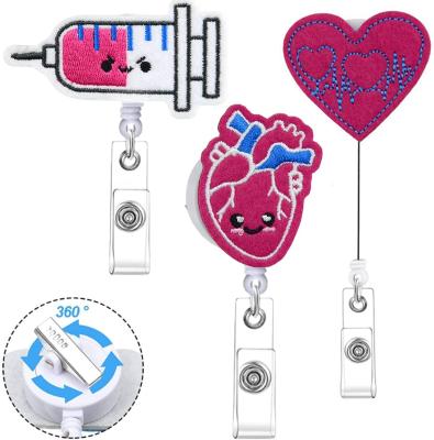 China Nurse Badge Reels Retractable Cute Embroidery Name Felt Cardiac Lung Injector Nurse Badge Reels Retractable ID Badge Holder for Baby Bottle Doctor Worker for sale