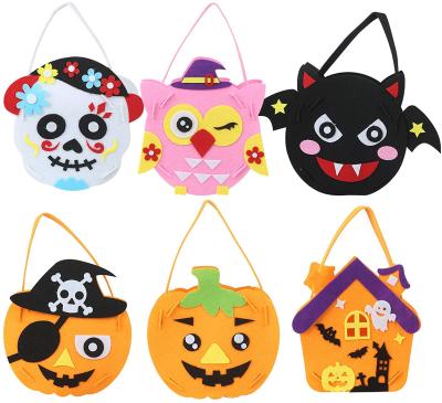 China Polyester Felt Wholesale 2021 Halloween Decoration Handbag Pumpkin Ghost Candy Tote Basket Gift For Kids for sale