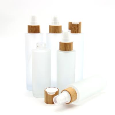 China Personal Care Cosmetic Airless Lotion Bottle 150ml 80ml Pump Bottle Glass+Bamboo Luxury Lotion Bottle for sale