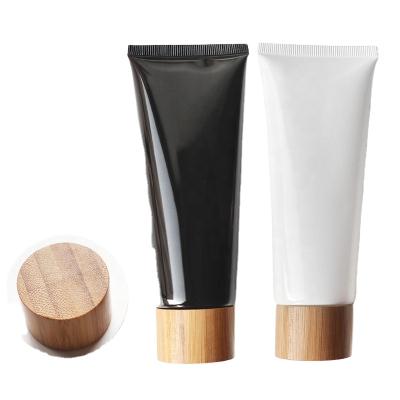 China Personal Care Empty Tubes For Face Wash 80g Cosmetic Tube 120g Soft Plastic Tubes With Bamboo Screw Lid for sale