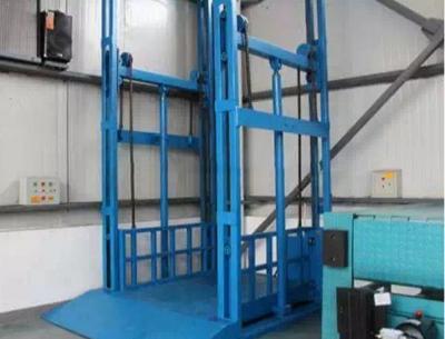 China 900kg - 3000kg Hydraulic guide rail elevator with 0.15m - 15m Lifting Height for sale