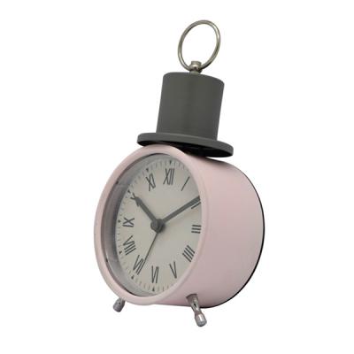 China Raymons Class 4 Inch Round Retro Classic Simple Mechanical Table Clock Metal Bell Alarm Clock Design for sale