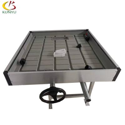 China Stable structure easily assembled Foshan kunyu ebb and flow planting hermp greenhouse seed bed grow rolling benches for sale