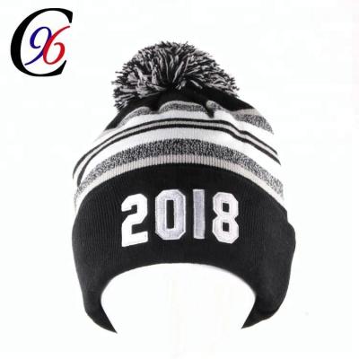 China Chengxing JOINT brand wholesale fashion knitted winter sports pom pom knit hat custom beanie for sale