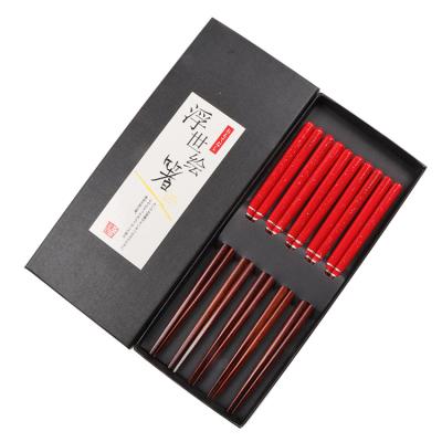 China Viable classic natural wood reusable red chopsticks five pairs minimalistic chopsticks easy to use from a gift box for sale