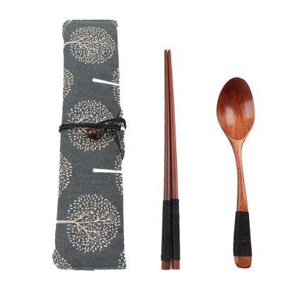 China Viable Reusable Wooden Chopsticks Spoon Fork Set Exquisite and Ambient With Cloth Carry Bag Cutlery Set for sale