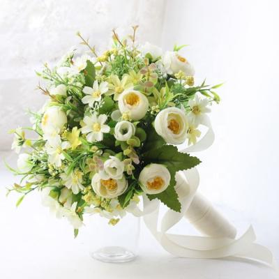 China Minimalist Bride Holding Flowers Silk Photo Wedding Simulation Bouquet Flowers Wholesale for sale