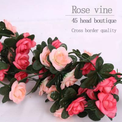 China Minimalist artificial rose rattan 45 small roses wedding decoration artificial flower plastic silk flower for sale