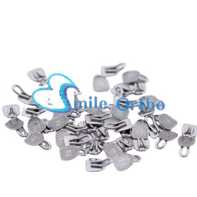 China Best Selling Orthodontics Dental Orthodontic Material Inside Rectangular Oral Cavity Bondable Traction Hook for sale