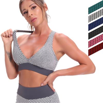 China Breathable Good Quality Stretch Woman High Print Cross Back Padded Ladies Sport Backless Sports Gym Bra Fitness Yoga Wear Bra Tops for sale