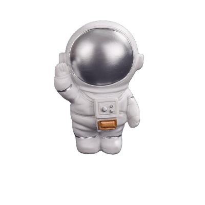 China China factory designed resin new open space astronaut home decoration living room desk table desk ornament for sale