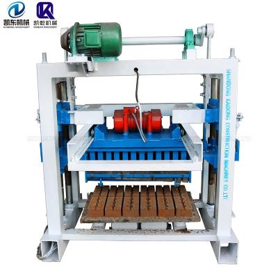 China Portable QT4-40 Semi automatic concrete hollow solid interlock brick making machine Te koop