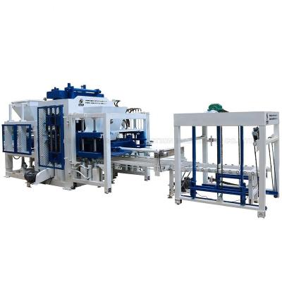 中国 QT10-15 automatic hollow paving brick making machine block with hydraulic and vibration technology 販売のため