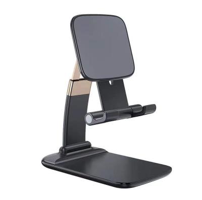 China ABS Plastic Mobile Phone Bracket Universal Stand Foldable Desktop Phone Desk Stand for Tablet and Mobile Phone for sale