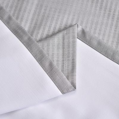 China Popular Luxury 3 Pass Shrink-Resistant Coated 100% Blackout Curtain Fabric For Living Room for sale