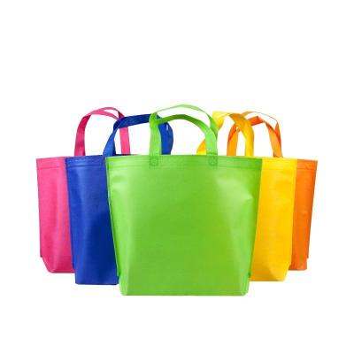 China Eco-friendly Durable Colorful Logo Tote Bag Wholesale Custom Pocket Grocery Bag Foldable Non-Woven for sale