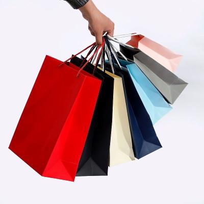 China Custom Wholesale Paper Eco-friendly Bag Manufacturer China Boutique Shopping Gift High Quality Cheap Paper Bag for sale