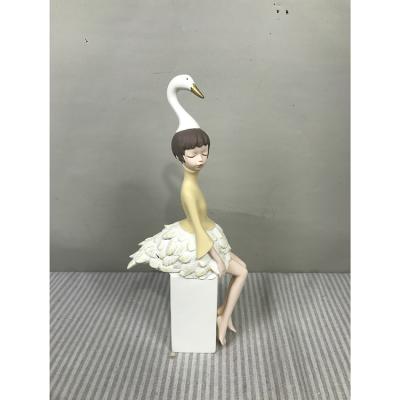 China Modern Nordic CIA Sit Swan Girl Sculptures Resin Figurines For Decoration Fashion Girl Wedding Home Decor for sale