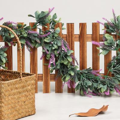 China Rustic Faux Lavender Flower Weave Artificial Green Leaves Rattan for Wedding Arch Wall Table Festival Artificial Flower Vines Decor for sale