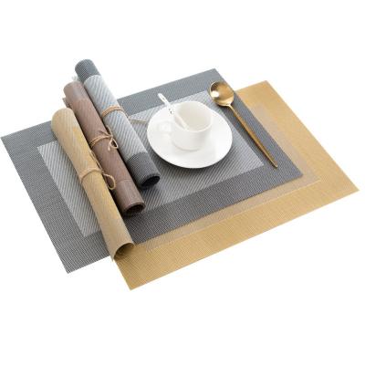 China Stylish Style Durable Hotel Place Mat PVC Teslin Wholesale Heat Insulation Dinner Table Mat Home Non-slip Washable Woven Pad for sale