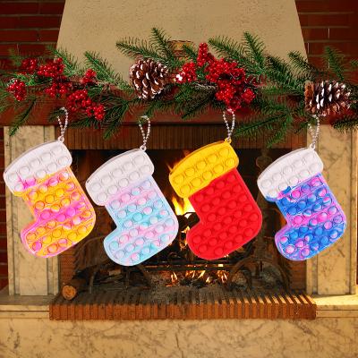 China Sensory Squishy Person Toy Christmas Stocking Kids Pop Up Squeeze Person Toy Squeeze Sensory Toys Bubble Noise Push Bag Kids Gift Bag Purse for sale