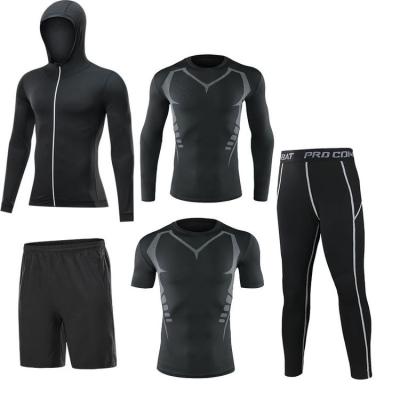 China Breathable Workout Clothes Long Sleeved Men Gym Sports Fitness Shirts Quick-Drying Clothes Suite 5 Piece Suit for sale