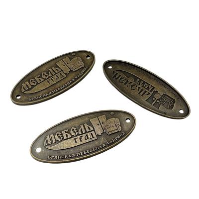 China WJK Nickel Free/Lead Free/Top Quality Cavity Cut Handbags Metal Tags With Custom LOGO For Furniture for sale