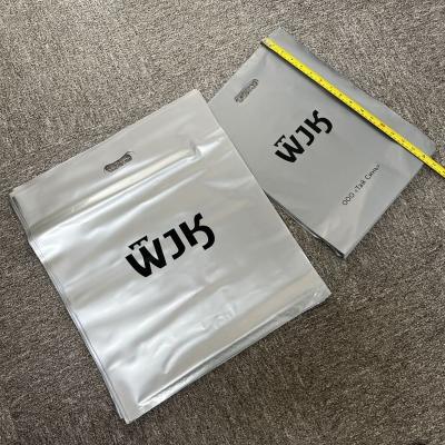 China WJK Disposable Customized Logo Frosted Zipper Bag Plastic Packaging Bag For Clothing for sale