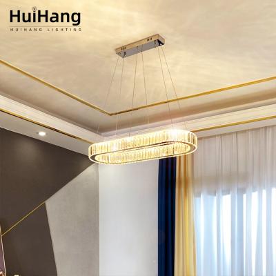 China HUIHANG modern new products high transmittance no strobe gold hanging installation led chandelier pendant light for sale