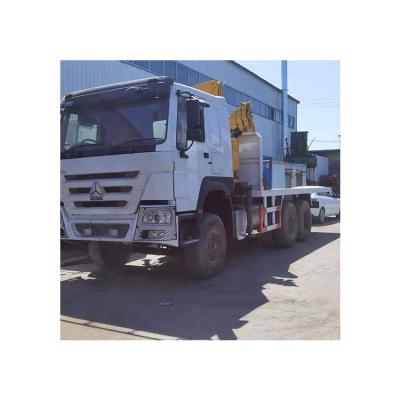 China Cloth Factory Price Sinotruk Howo 6x4 Drive Wheel 12770kg Timber Flatbed Truck for sale