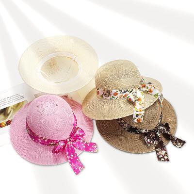 China Fashion To Keep Hot Wholesale Classic Styles Bowknot Wide Straw Bucket Hats For Women Straw Hats Beach Sun Ribbon Brim for sale