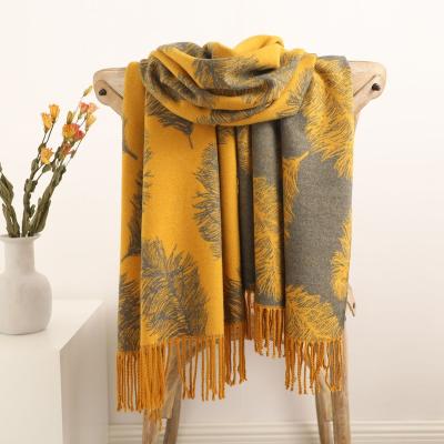 China Korean American European Style Feather Printing Two Color Cashmere Printing Tassel Muslim Shawl Hot Scarf Women Double Sided Scarf for sale