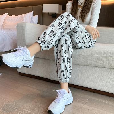 China Wholesale high quality high waist women's anti-pilling letter printed elastic waist pants ladies casual harem pants for sale