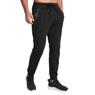 China Anti-Wrinkle Black Jogger Bottoms For Men Slim Fit Jogging Bottoms With Zipper Pockets for sale