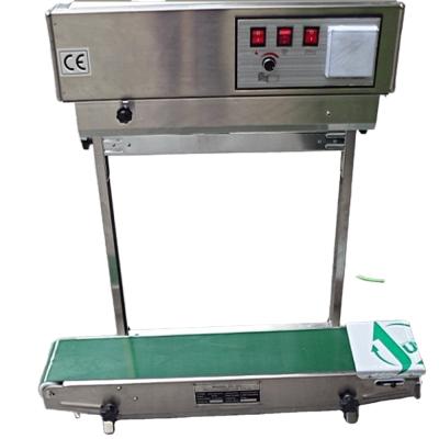 China FR-900II Beverage Aluminum Foil Bag Vertical Continuous Sealer for sale