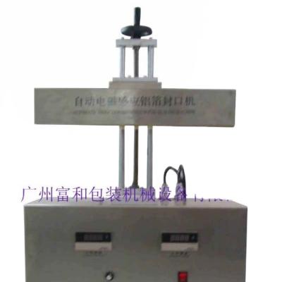 China Food GLF--1800 Automatic Electromagnetic Induction Aluminum Foil Sealing Machine for sale