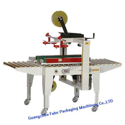 China FXJ-5050 Beverage Top and Bottom Automatic Drive Paper Cardboard Adhesive Tape Sealing Machine for sale