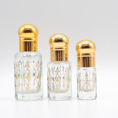 China With stick factory hotsale 3ml 6ml 12ml glass bottle glass essence perfume gold Arabian oils bottle for sale